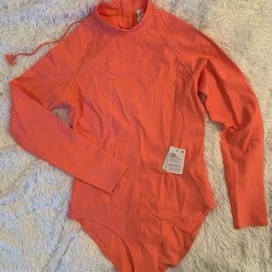 Lululemon Paddle Suit size 8, orange color